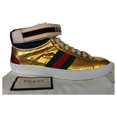 gucci gold sneaker|black and gold Gucci sneakers.